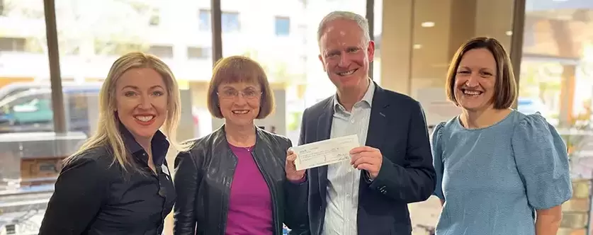 Director of the Ladybird Foundation Dr Pamela Hendry presents cheque to Professor Paul Cohen, Issy Black, and St John of God Foundation Philanthropy Manager Maria Moffitt. 